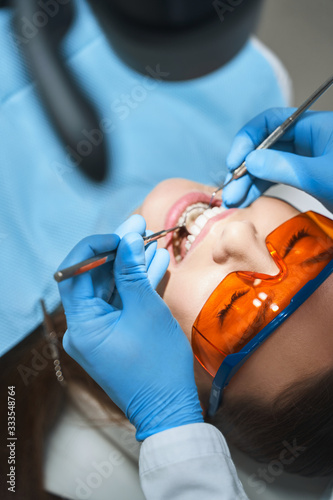 Woman during teeth check up stock photo