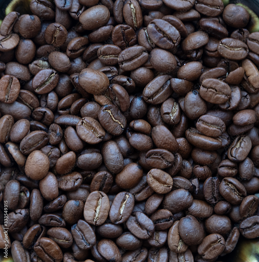 Fototapeta premium Natural coffee beans, close-up, top view.