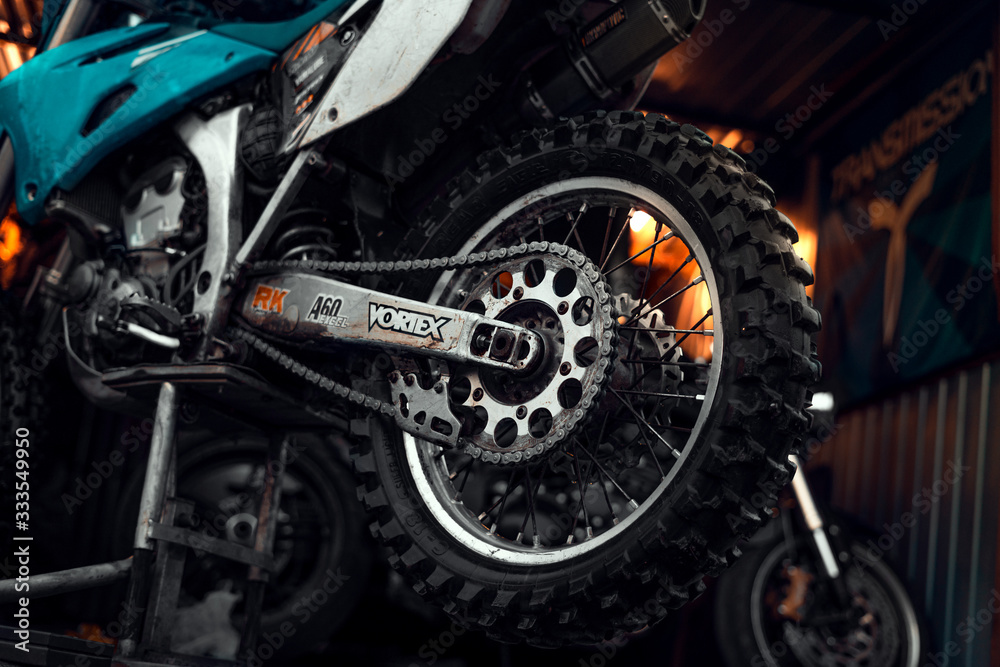 27 March 2020 Wroclaw - Back wheel of motocross Yamaha WR 250r. Motorcycle  stands in front of a workshop on motorbike stand, waiting for components  inspection before moto season. Stock-Foto | Adobe Stock