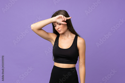 Young girl woman over isolated background with tired expression