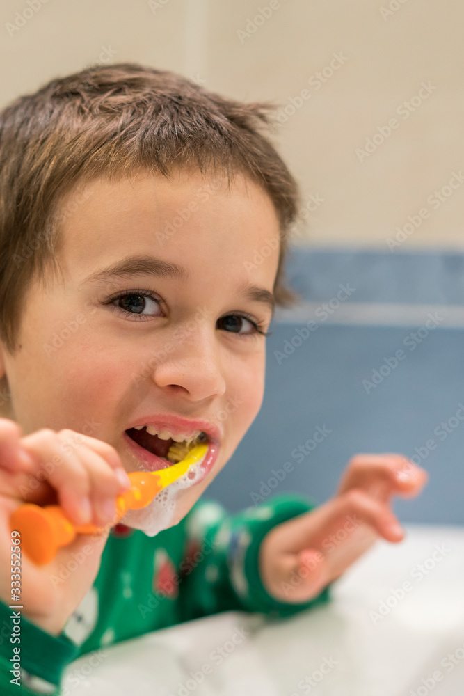 Close-up of young boy brushing teeth with toothbrush Portrait of healthy little boy enjoy cleaning his teeth with a happy face, Happy child brushing his little teeth in bath room, Dental concept Close-up of young boy brushing teeth with toothbrush Portrait of healthy little boy enjoy cleaning his teeth with a happy face, Happy child brushing his little teeth in bath room, Dental concept
