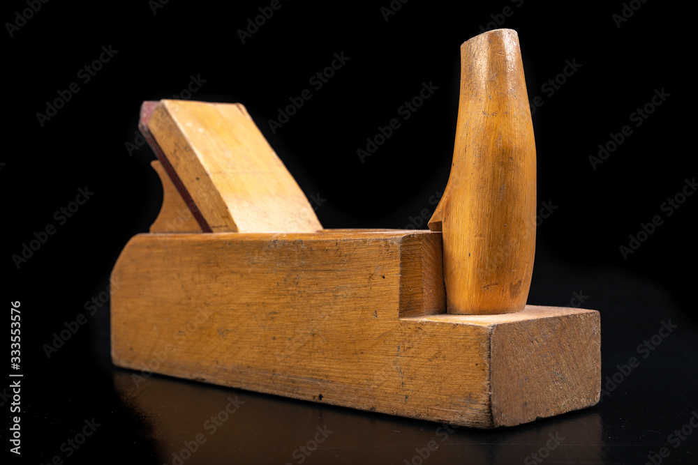 Carpentry planer for leveling wood. Carpentry accessories in the workshop. Carpentry planer for leveling wood. Carpentry accessories in the workshop.