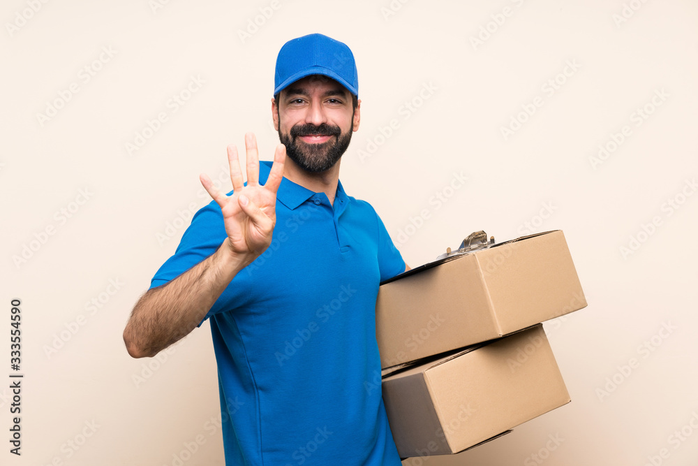Delivery man with beard over isolated background happy and counting four with fingers Delivery man with beard over isolated background happy and counting four with fingers
