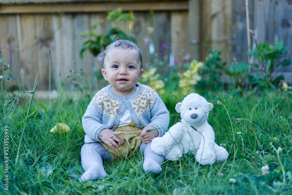 Baby and teddy bear outdoors Baby and teddy bear outdoors