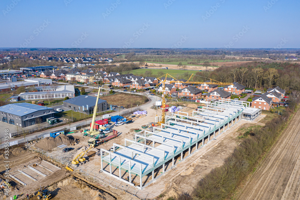 Obraz premium huge company building is erected on a large construction site