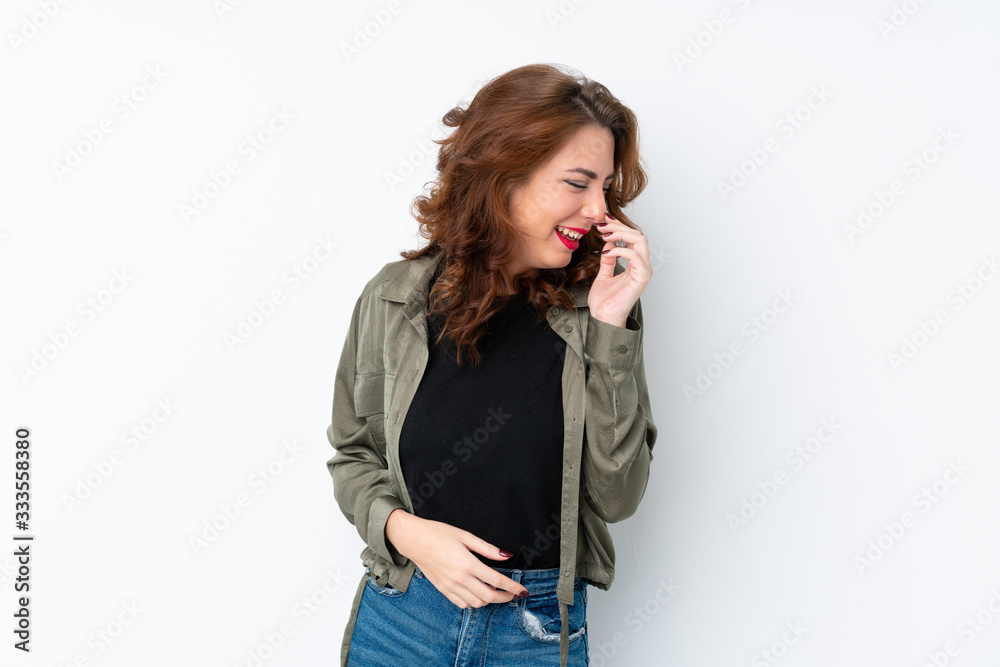 Young Russian woman over isolated white background smiling a lot Young Russian woman over isolated white background smiling a lot