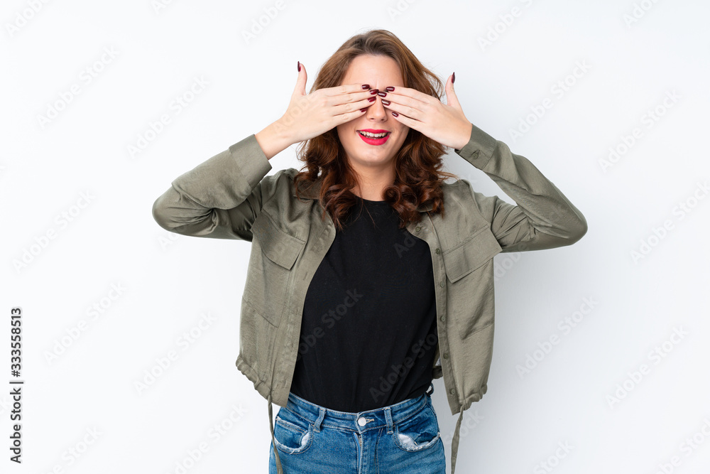 Young Russian woman over isolated white background covering eyes by hands Young Russian woman over isolated white background covering eyes by hands