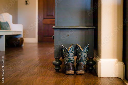 Even city folks leave their worn cowboy boots by the door in Texas.