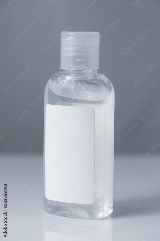 transparent jar with an opening lid. bottle with antiseptic gel transparent jar with an opening lid. bottle with antiseptic gel