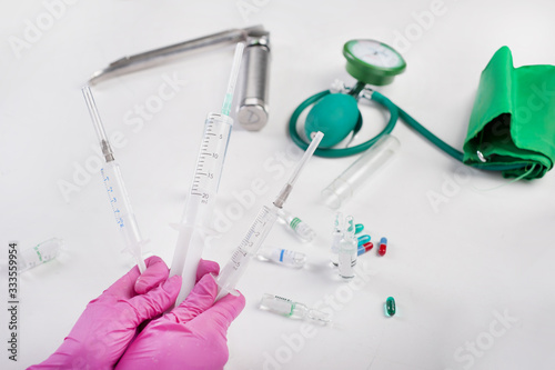 doctor holding syringes in hands, medicine illustration