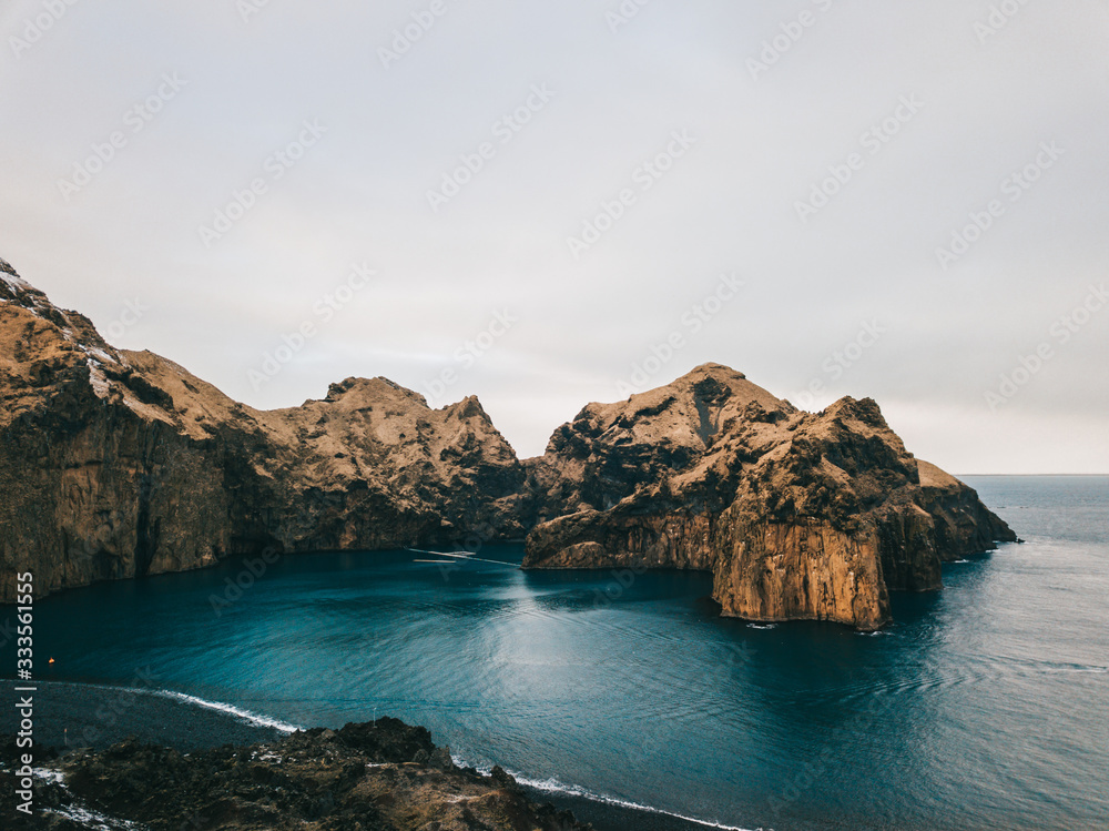 Sunny view of Helgafell volcano on Westman Islands Vestmannaeyjar Sunny view of Helgafell volcano on Westman Islands Vestmannaeyjar