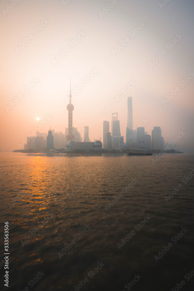 Panoramic Cityscape of Shanghai Skyline during Sunrise with orange skies