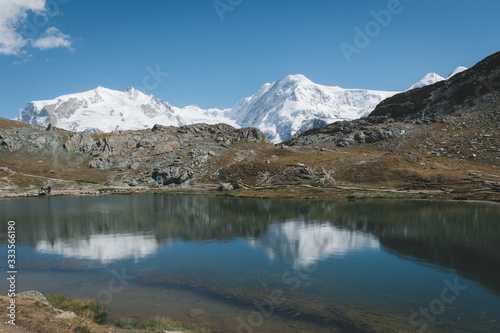 lake in snow covered mountains in Zermatt  Switzerland