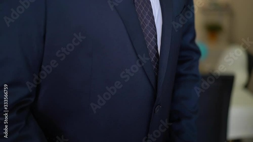 african american man getting dressed