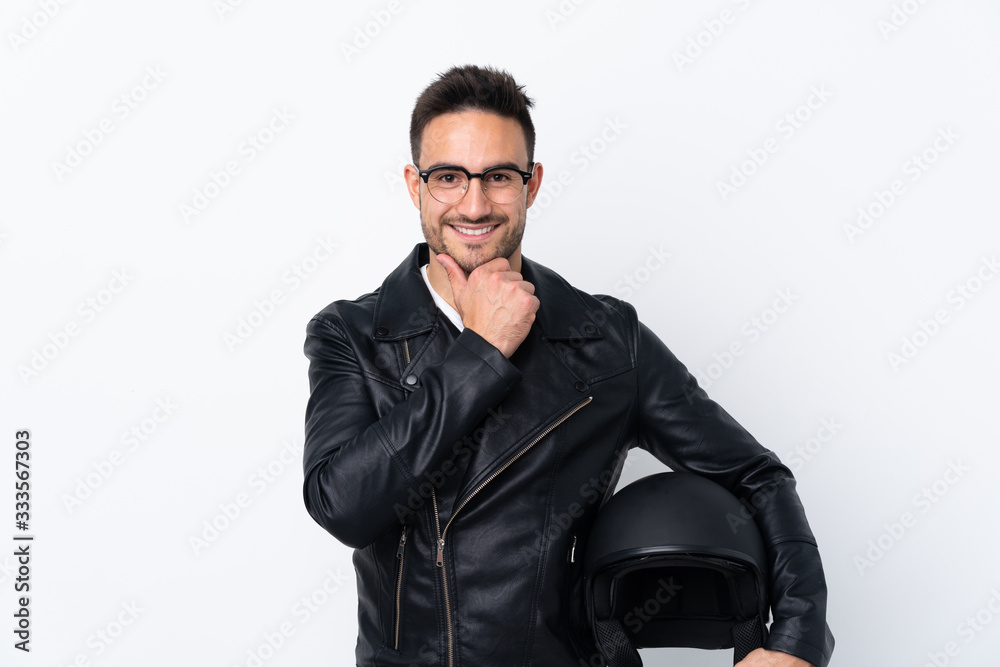 Man with a motorcycle helmet with glasses and smiling Man with a motorcycle helmet with glasses and smiling