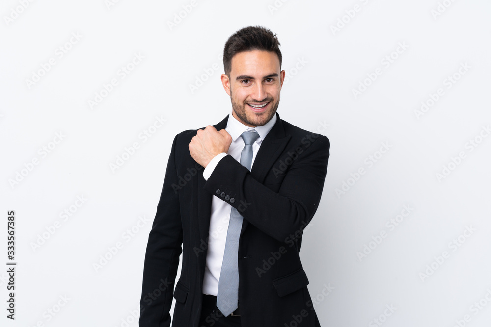 Young business man over isolated background celebrating a victory Young business man over isolated background celebrating a victory