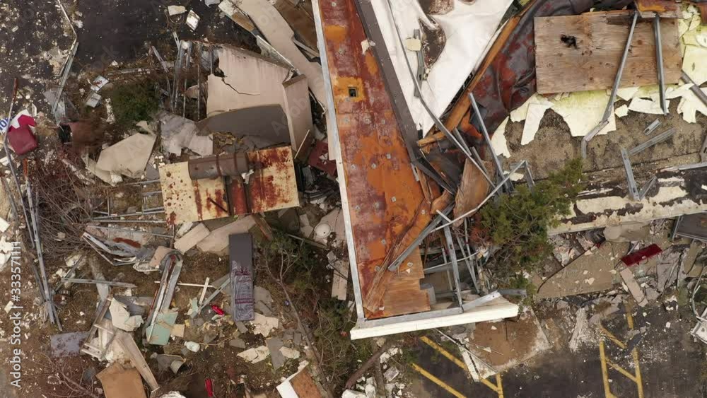 Rubble and debris on roof top from tornado disaster 4k