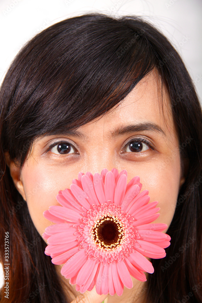Woman Posing With Flower in white background Woman Posing With Flower in white background