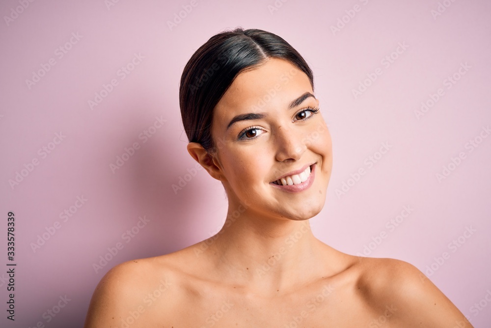 Close up of young beautiful woman with clear and pure skin. Perfect and clean skincare wearing natural makeup. Smiling happy looking fresh and healthy. Close up of young beautiful woman with clear and pure skin. Perfect and clean skincare wearing natural makeup. Smiling happy looking fresh and healthy.