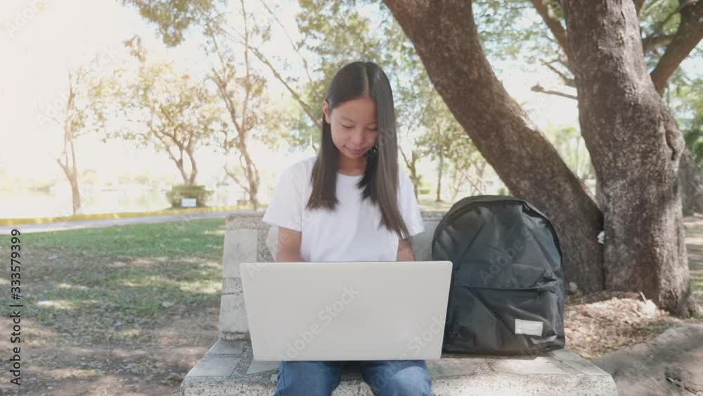 Back to School. asian girl using his laptop to learning online. Back to School. asian girl using his laptop to learning online.