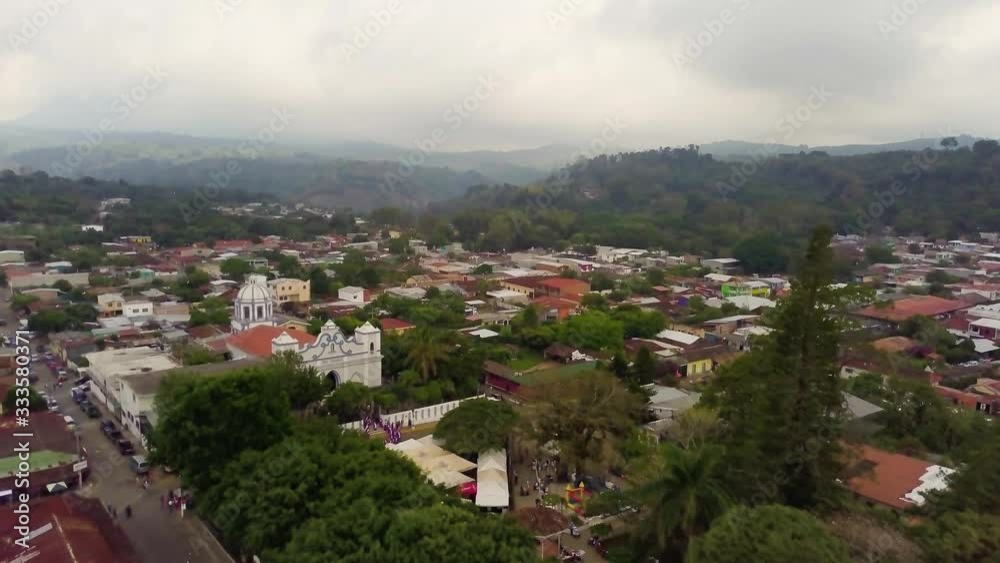 An aerial view of a cloudy day in the Ataco town in El Salvador. An aerial view of a cloudy day in the Ataco town in El Salvador.