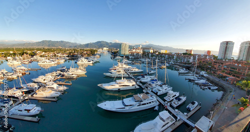 Puerto Vallarta, Famous El Faro lighthouse with panoramic view Puerto Vallarta marina from the restaurant on top © eskystudio