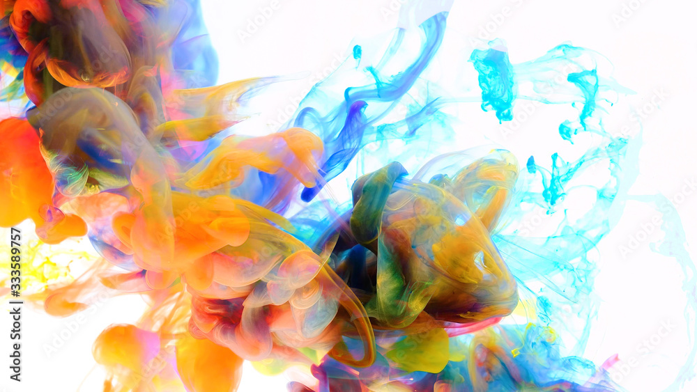 Obraz premium Color drops in water , abstract color mix , drop of Ink color mix paint falling on water Colorful ink in water