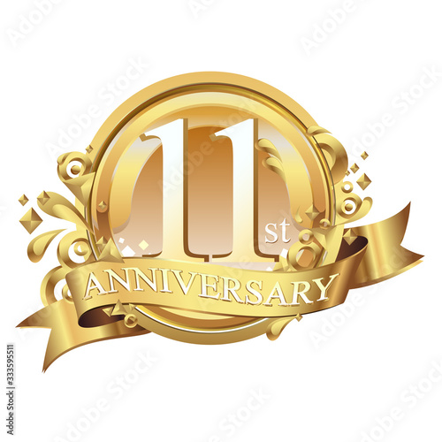 11 years golden anniversary logo celebration with ring and ribbon.