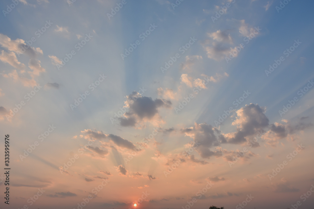 Bright orange sky and light of the sun.