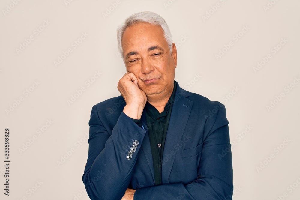 Middle age senior grey-haired handsome man wearing elegant business jacket thinking looking tired and bored with depression problems with crossed arms. Middle age senior grey-haired handsome man wearing elegant business jacket thinking looking tired and bored with depression problems with crossed arms.