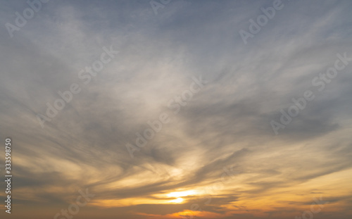 Abstract amazing Scene of stuning Colorful sunset with Moving clouds background in nature and travel concept  wide angle shot Panorama shot.