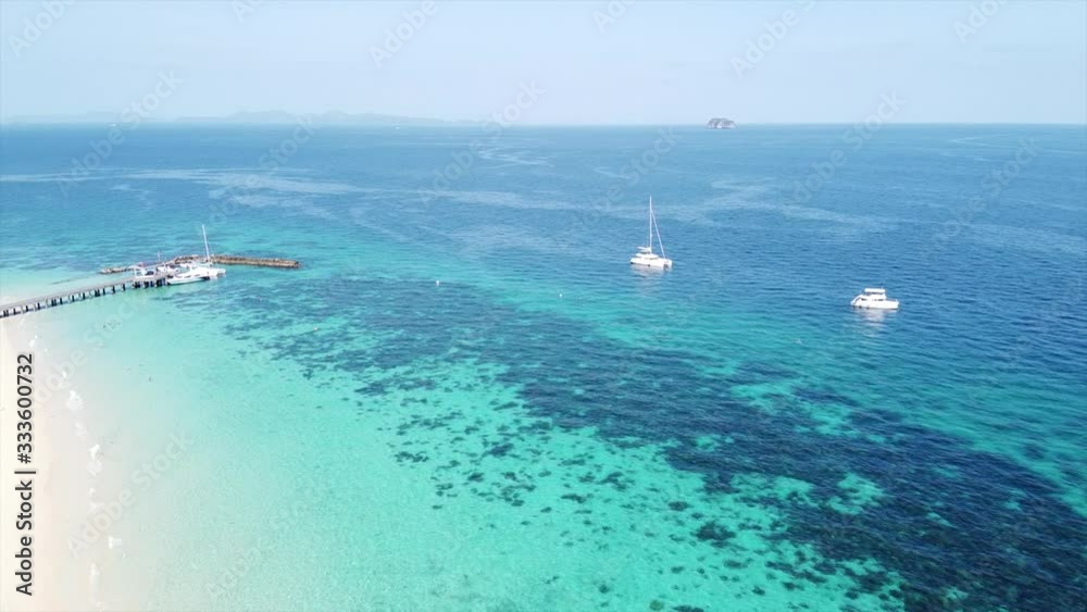 Aerial view of with beach turquoise blue sea water on the white sand shore beach Phuket Thailand Aerial view of with beach turquoise blue sea water on the white sand shore beach Phuket Thailand