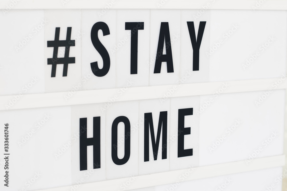 Stay Home written in a lightbox text. Coronavirus concept. Quarantine and isolation. Novel coronavirus. (2019-nCoV). Covid-19. Stay Home written in a lightbox text. Coronavirus concept. Quarantine and isolation. Novel coronavirus. (2019-nCoV). Covid-19.