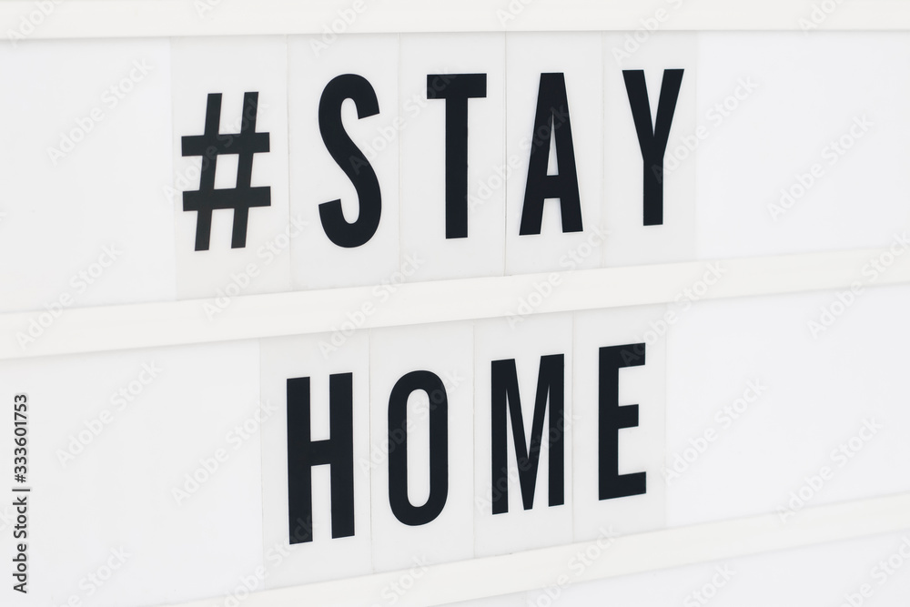 Stay Home written in a lightbox text. Coronavirus concept. Quarantine and isolation. Novel coronavirus. (2019-nCoV). Covid-19. Stay Home written in a lightbox text. Coronavirus concept. Quarantine and isolation. Novel coronavirus. (2019-nCoV). Covid-19.