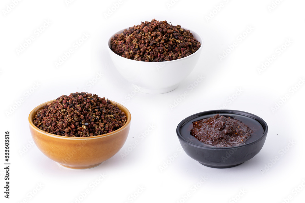 Chinese chili called Mala , paste, sauce , dried seed with dried red chili ,ingredient for Mala grilled street food ,isolated on white background Chinese chili called Mala , paste, sauce , dried seed with dried red chili ,ingredient for Mala grilled street food ,isolated on white background