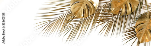 Gold palm and monstera leaves plant pattern frame banner isolated on a white background. top view. copy space. abstract.