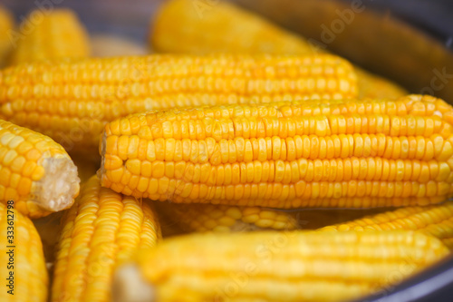 Steamed sweet yellow corns in market