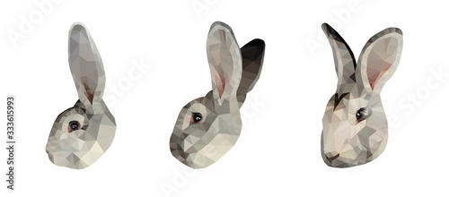Grey bunny face low poly triangular vector illustration isolated on white. Polygonal style trendy modern logo business fairy design template for  easter invitations and greetings.
