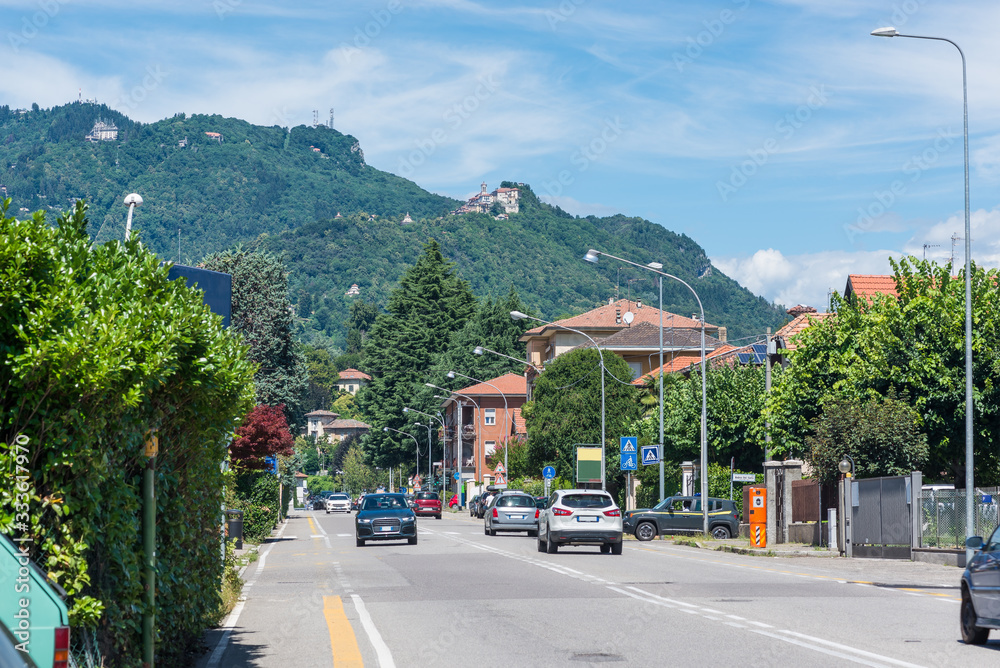 Characteristic view of Varese city with the Campo dei Fiori and the small village of Sacro Monte of Varese (top right), UNESCO site, seen from viale Aguggiari