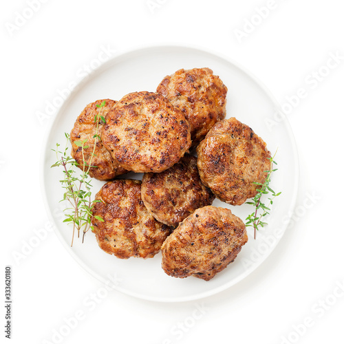 Juicy delicious turkey meat cutlets isolated on white background