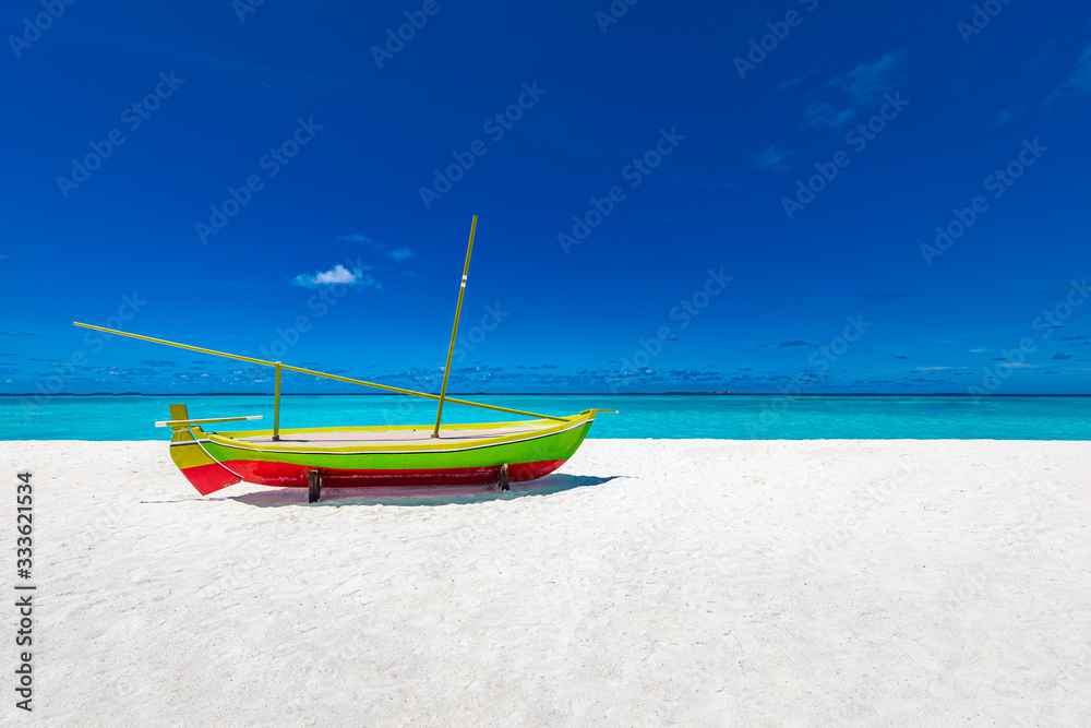 Traditional wooden fishing boat on the beach. Travel landscape, beach decoration