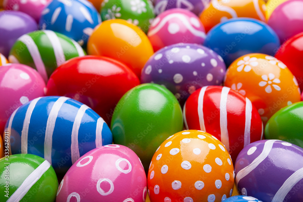 Decorated Easter eggs as background. Above view