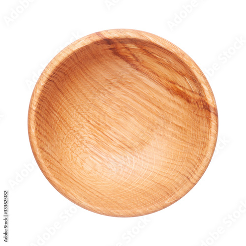 Wooden plate isolated on white background. Top view of empty dishware with space for text. Handcrafted cooking utensil