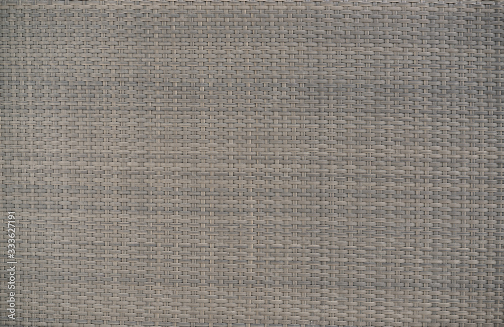 Rattan chair. A closed up background texture of a woven rattan chair. Rattan chair. A closed up background texture of a woven rattan chair.