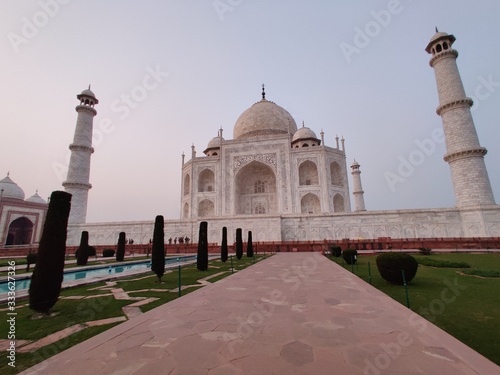 The Taj Mahal is an ivory-white marble mausoleum on the south bank of the Yamuna river in the Indian city of Agra.