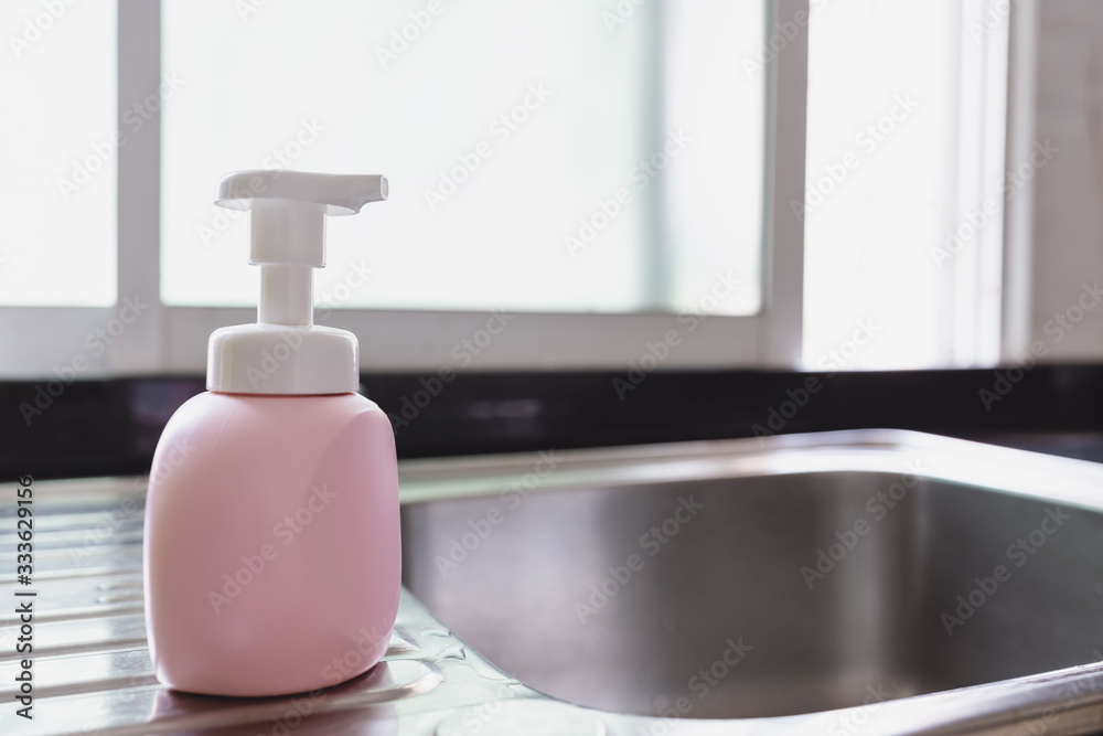 Anti bacteria soap on sink in the kitchen Anti bacteria soap on sink in the kitchen