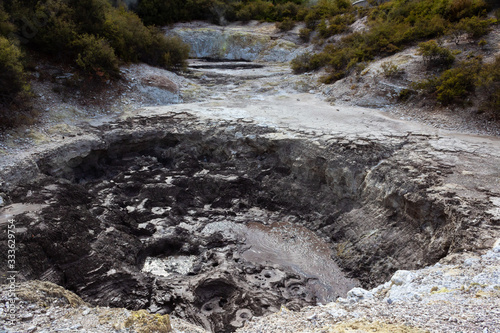 Mud pool in Whakarewarewa thermal valley in Rotorua, Te Puia, New Zealand photo