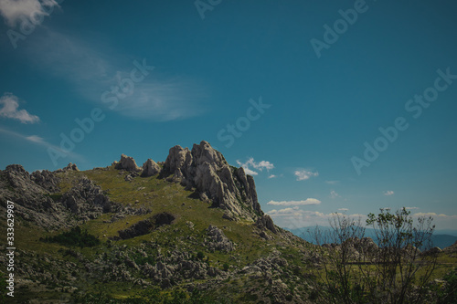 Panoramic view of Tulove Grede, a mountain range on velebit range above the Zadar region on a warm summer day with clear skies.