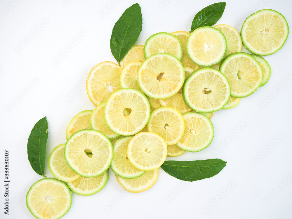 Lemon slices and leaves. Top view Lemon slices and leaves. Top view