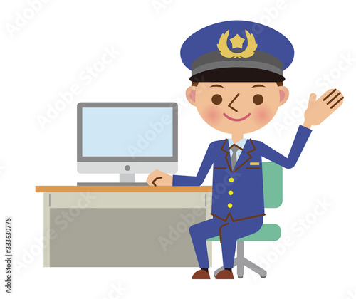 パソコンを使う男性警察官